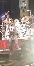 Ozzy Osbourne 
Ozzy adjust`s his pants - PNC Arts Center, NJ 8/11/01, 2001